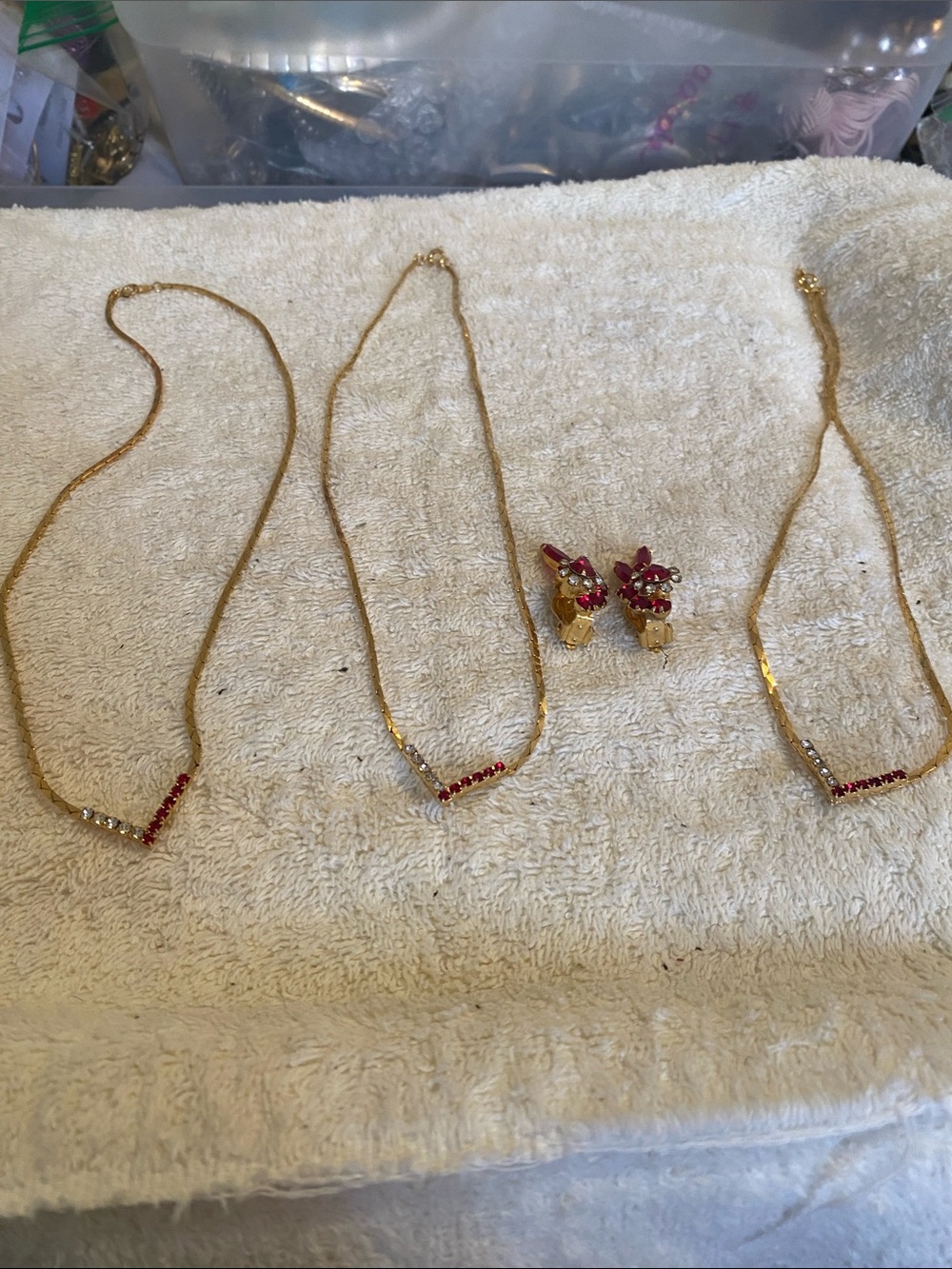 Gold-Tone V-Accent Necklace with Red Crystal Accents with clip earrings